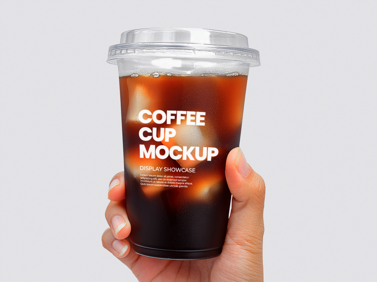 Coffee cup on hand mockup psd