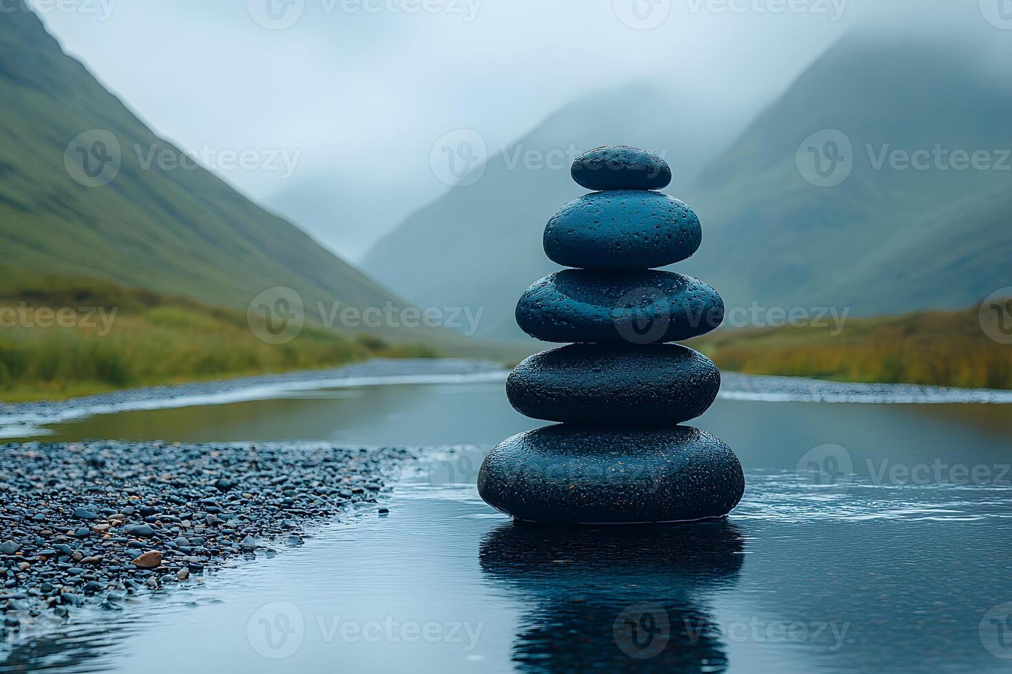 Zen Balance and Serenity in Nature Stacked Stones by Tranquil Mountain Lake photo