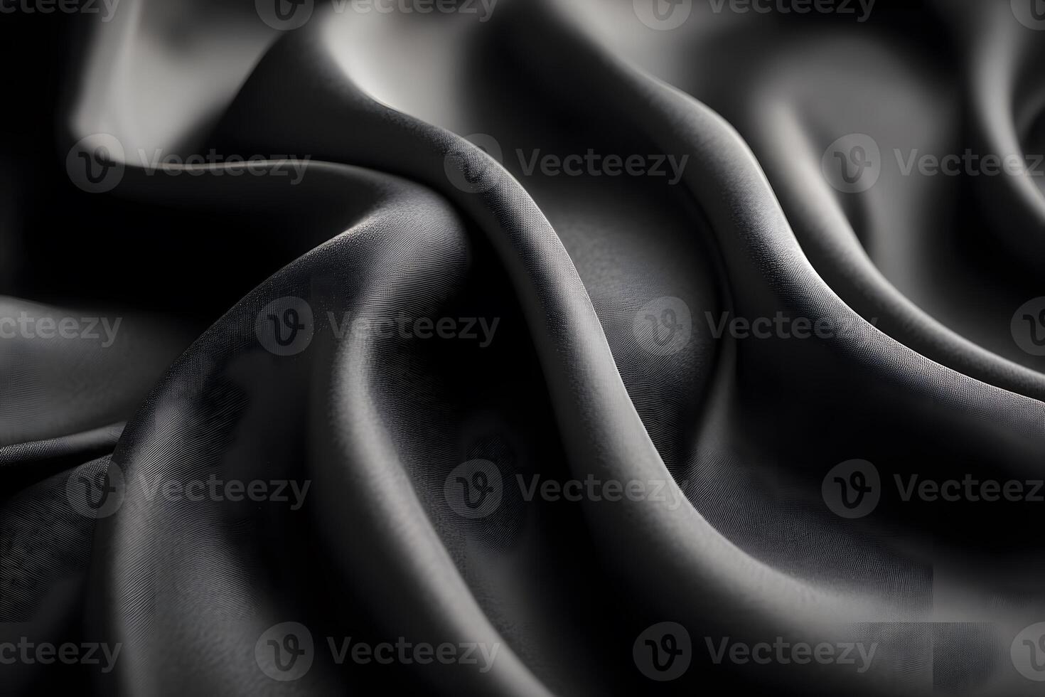 Luxurious Black Silk Fabric with Elegant Waves for Design and Textiles photo