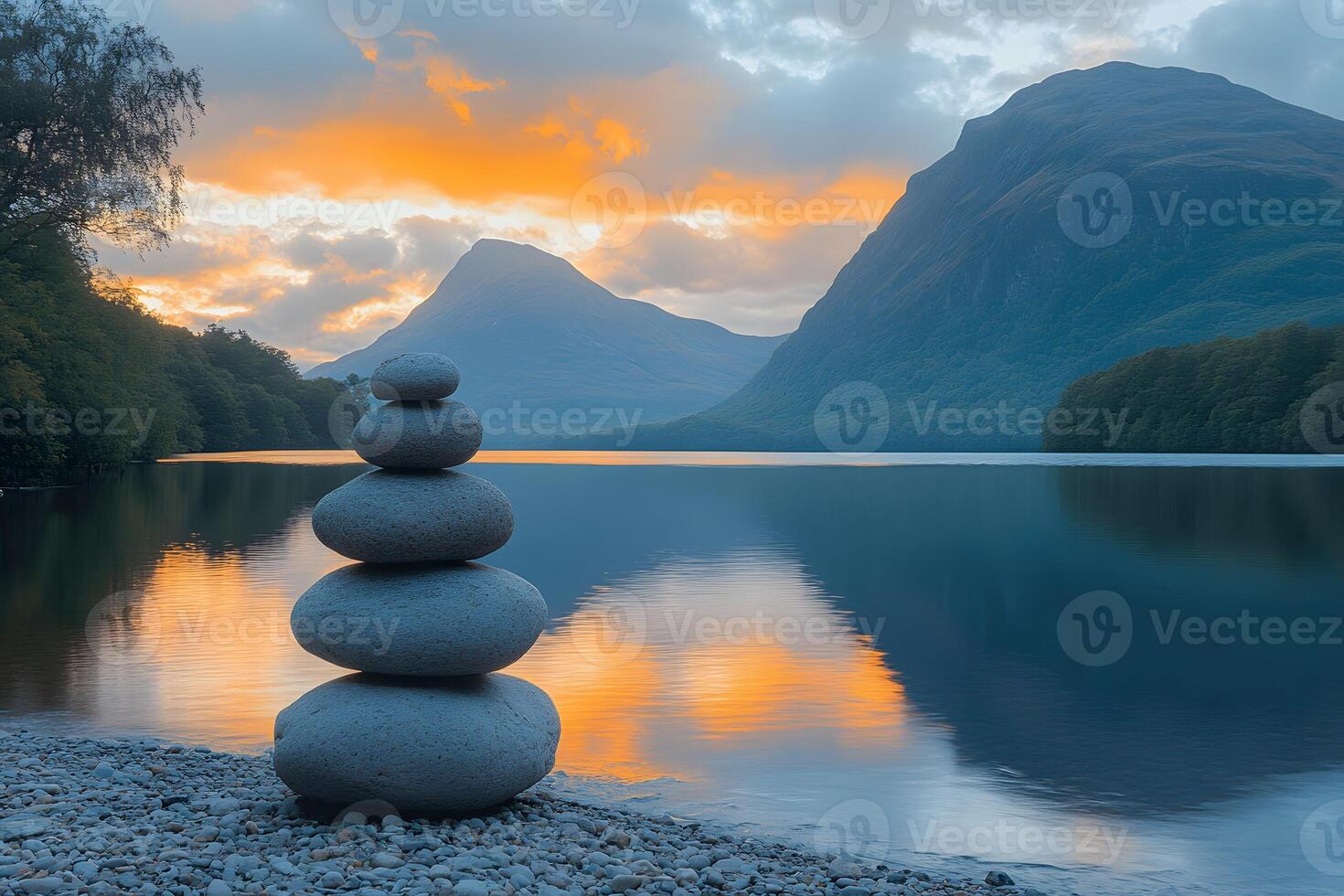 Tranquil Sunset by Mountain Lake with Stone Cairn Reflection in Nature Photography photo