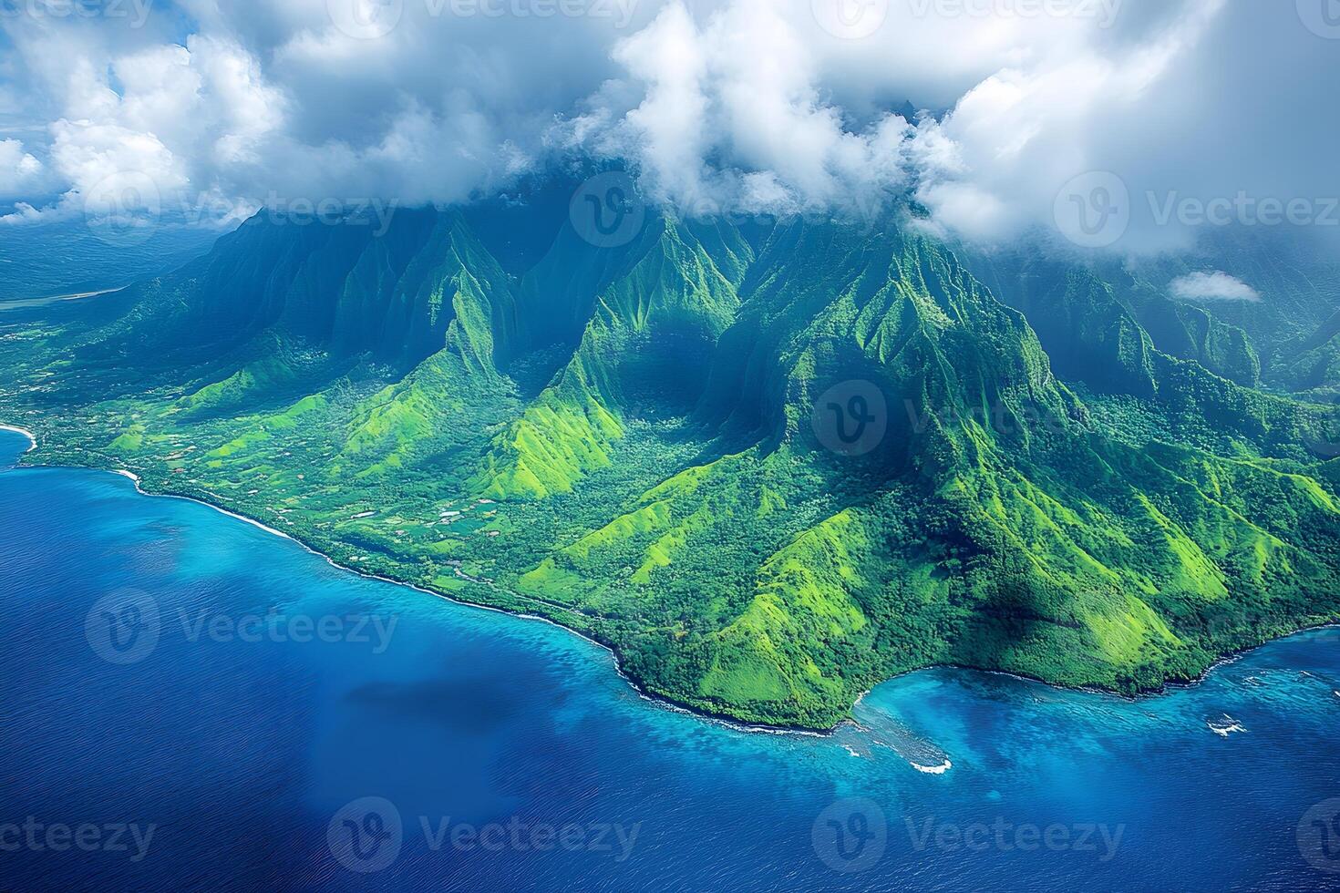 Majestic Aerial View of Lush Mountain Range and Vibrant Coastline under Cloudy Sky photo