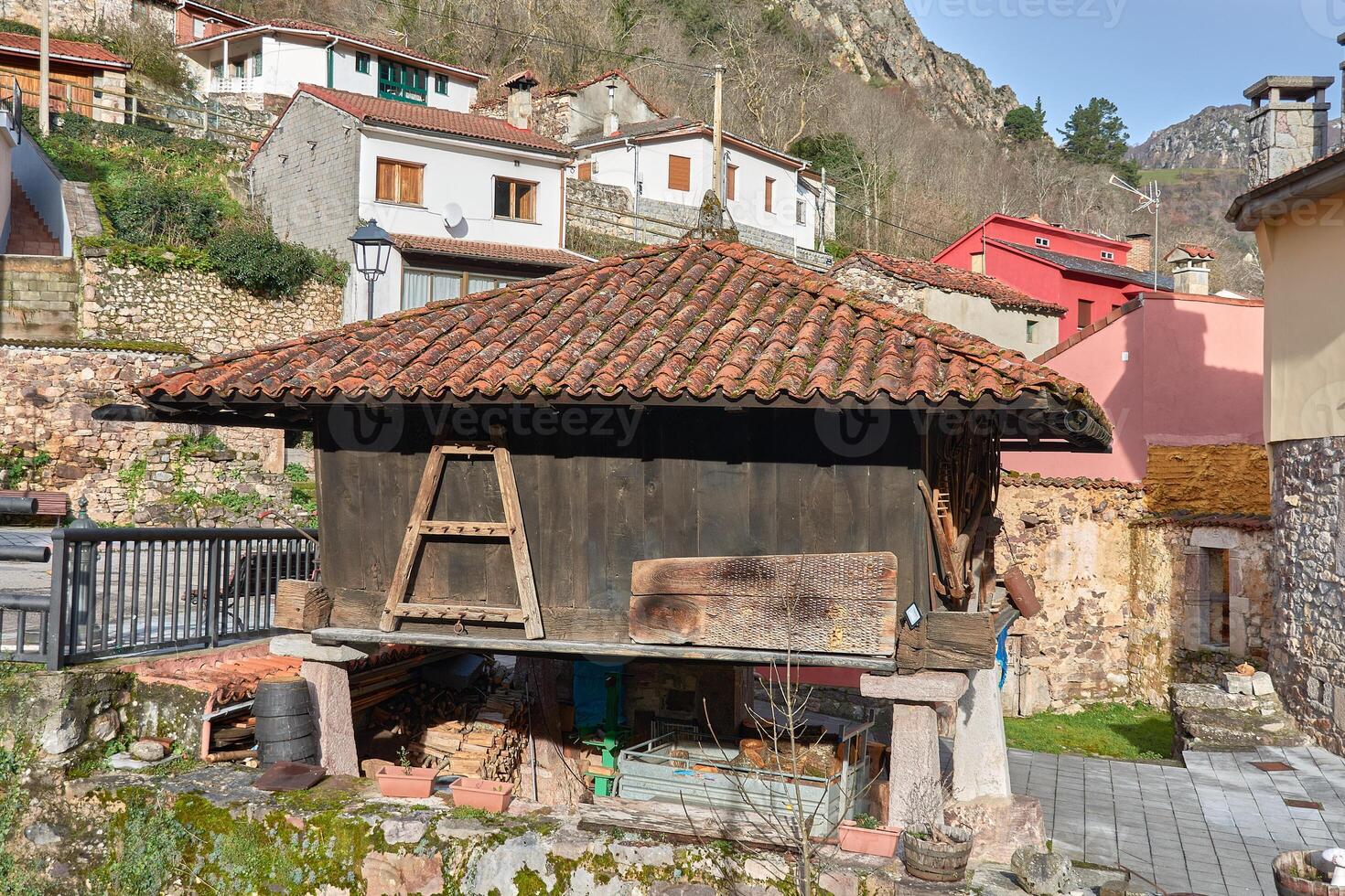 Ancient grain storage structure horreo in the mountains of asturias photo