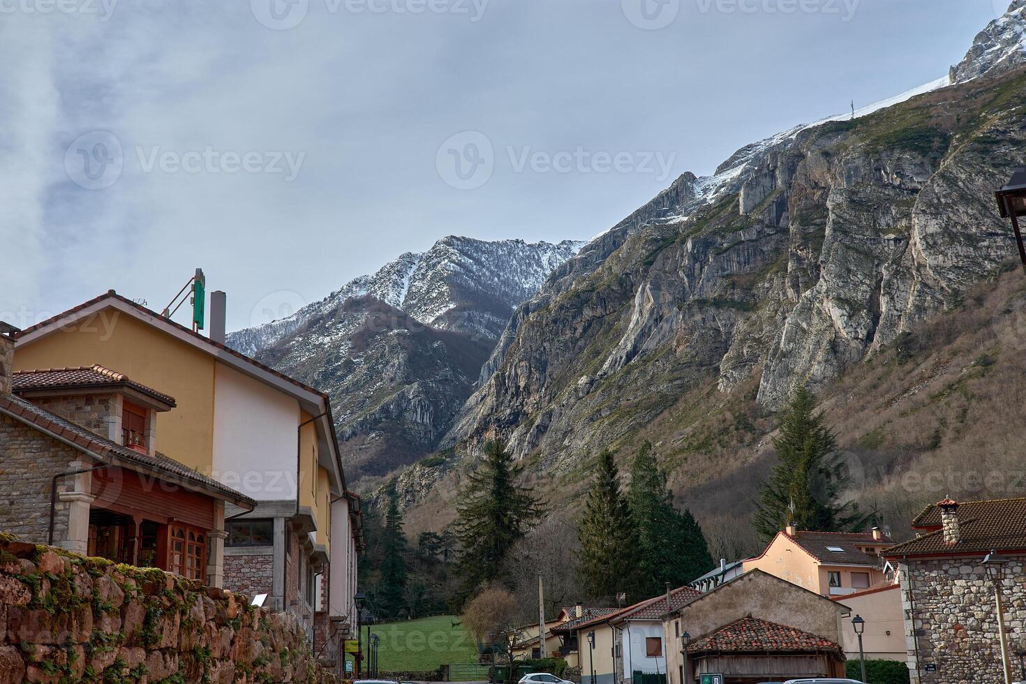 Serene Winter Landscape Penavera Mountain and Pola de Somiedo in Asturias photo