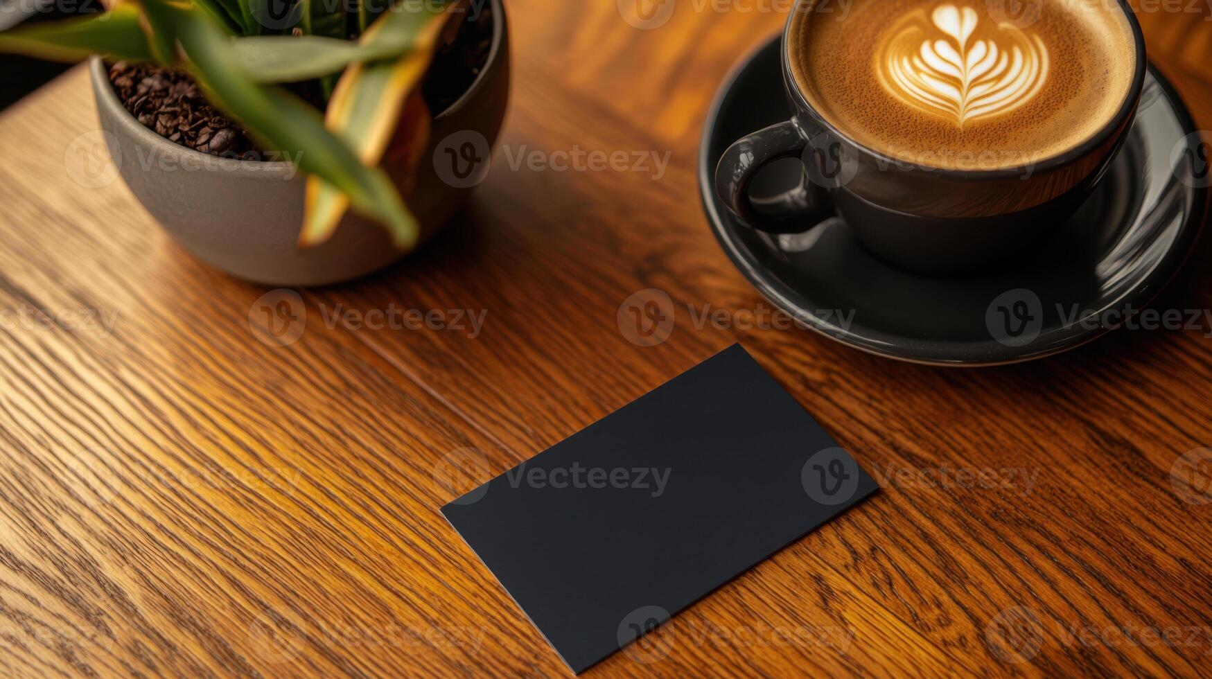 Coffee and business card mockup on wooden table photo