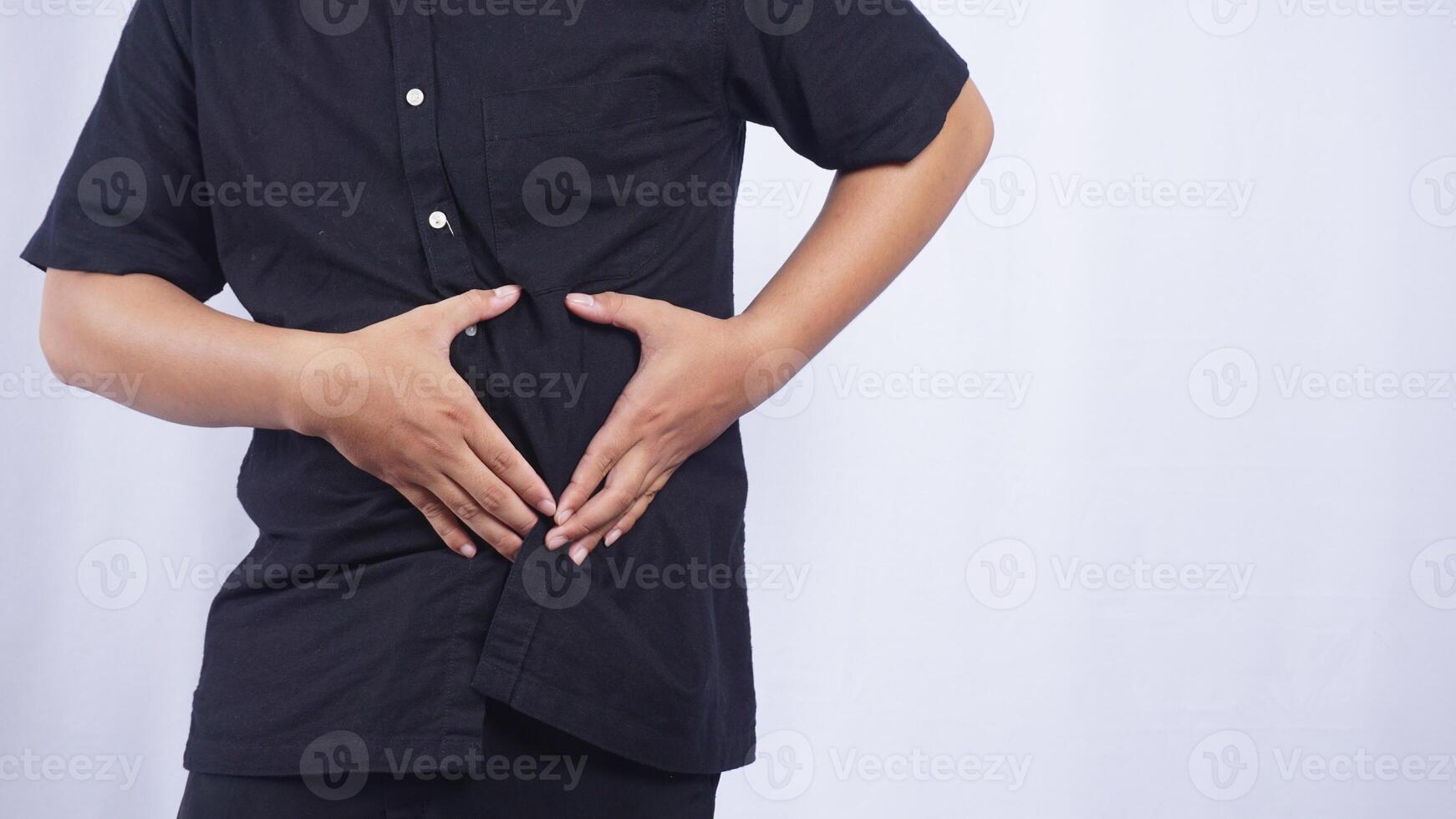 Close Up of Man Having Stomachache on White Background photo