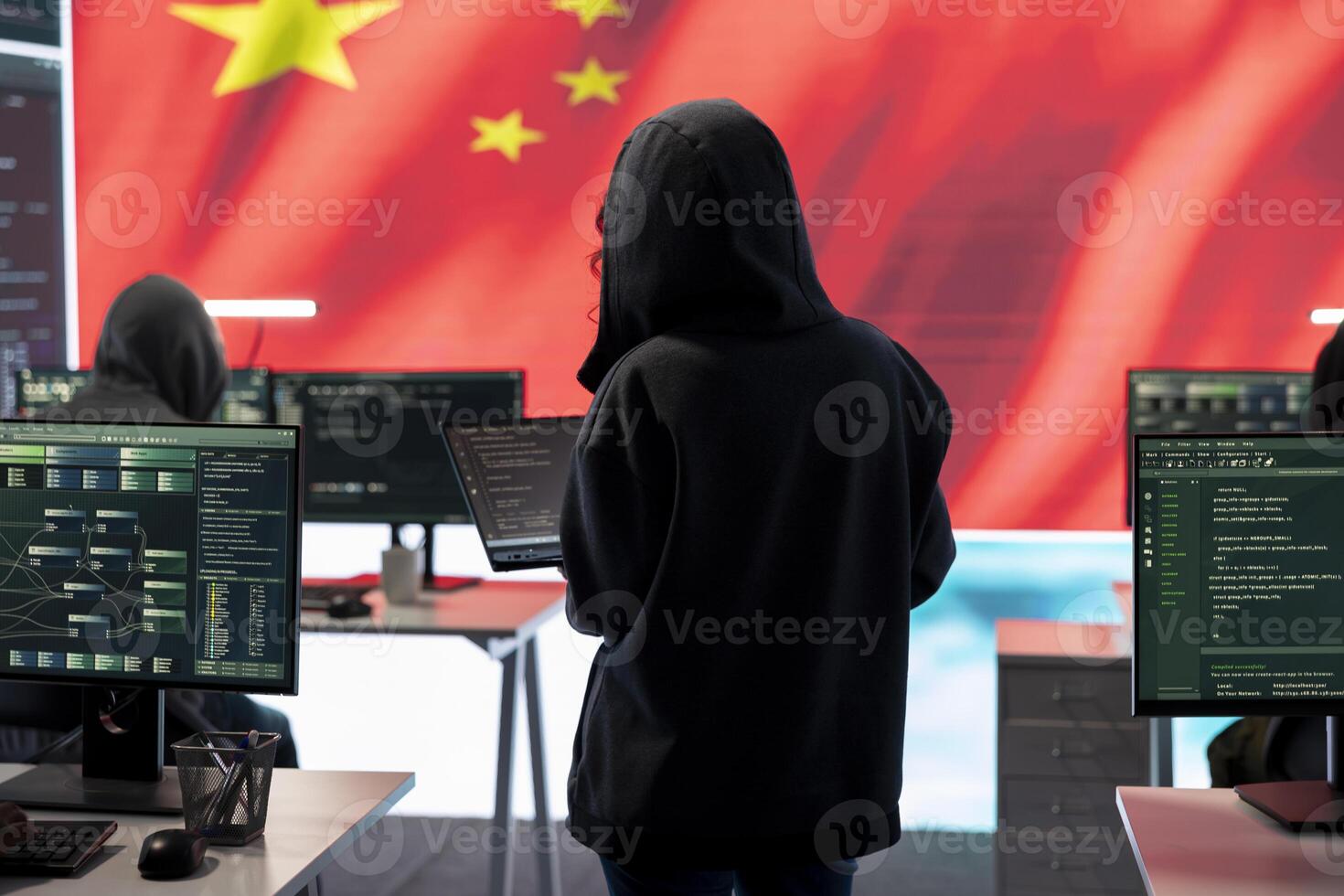 Terrorist person in a Chinese cyber security room hacking national systems, reading fake news and hybrid warfare propaganda. Digital mercenary group spread misinformation and falsification. photo