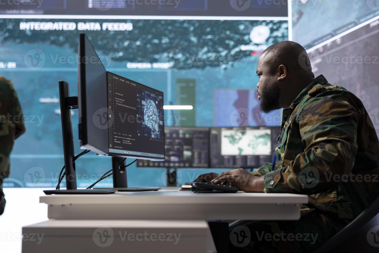 IT professional gathering real time intelligence from radar systems in military control tower, processing surveillance footage and transmitting crucial information to help with mission success. photo