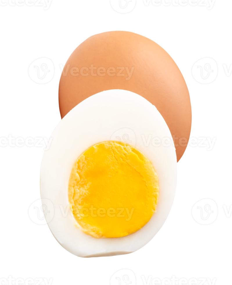 Single raw chicken egg and peeled cooked or boiled egg with egg yolk in half in stack isolated with clipping path in file format png