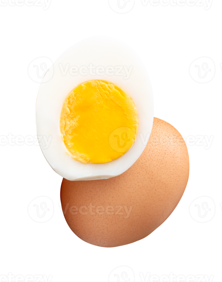 One raw chicken egg and peeled cooked or boiled egg with egg yolk in half in stack isolated with clipping path in file format png