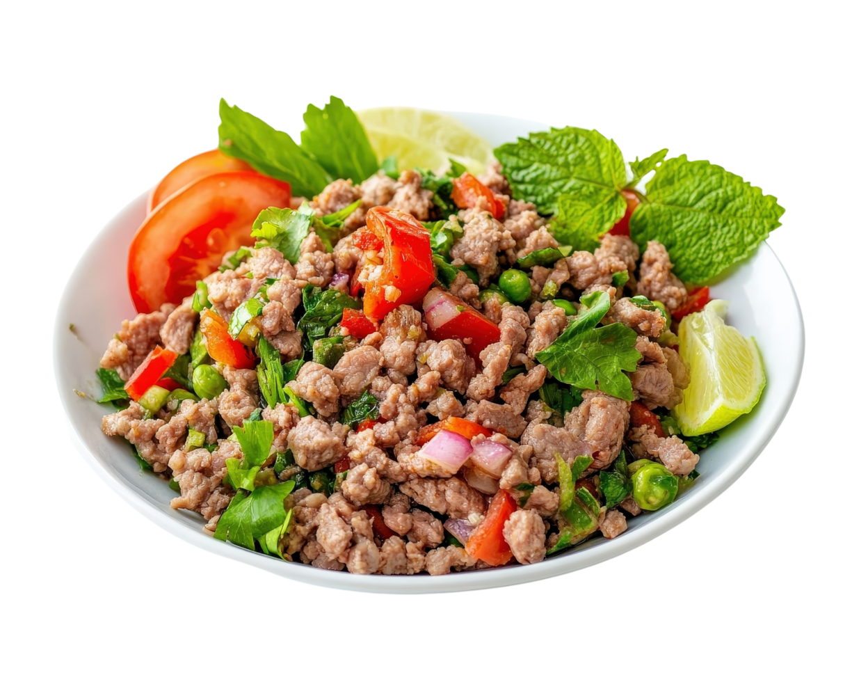 A bowl of meat and vegetables with a lime wedge png