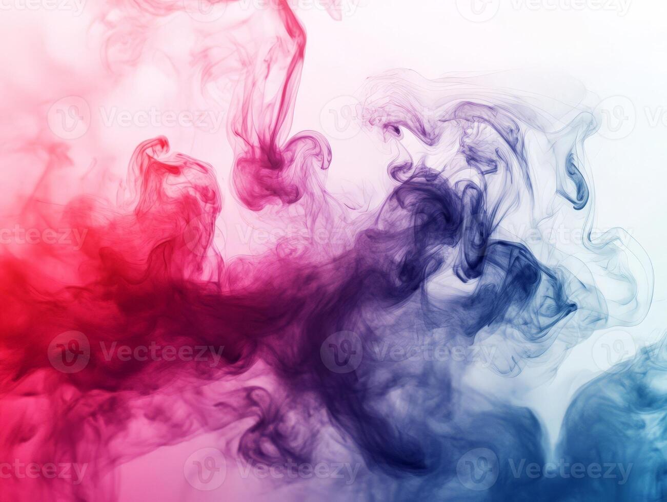 Abstract colorful smoke patterns blending in red and blue hues. photo