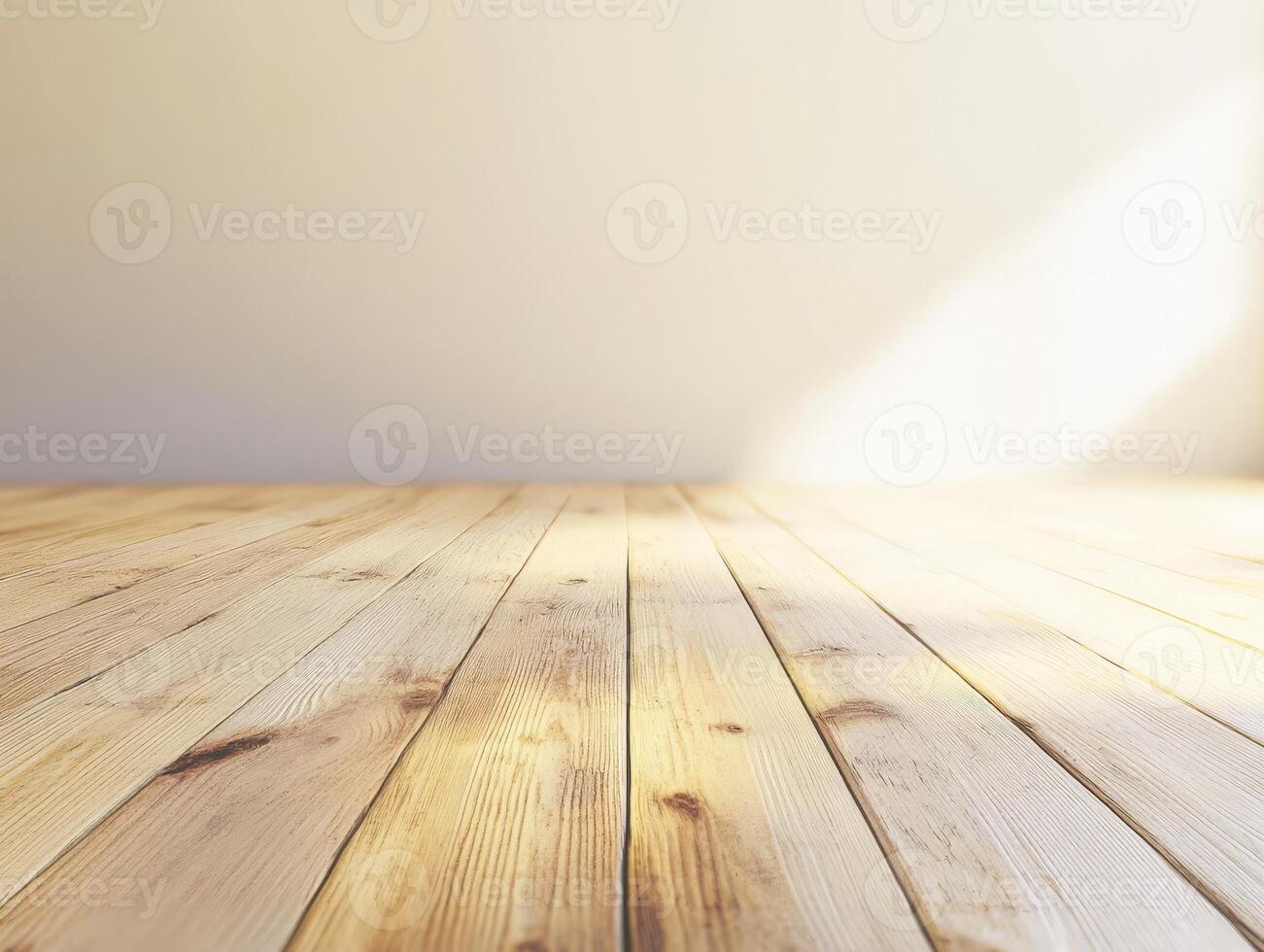 A bright, empty room with wooden flooring and a warm light source. photo