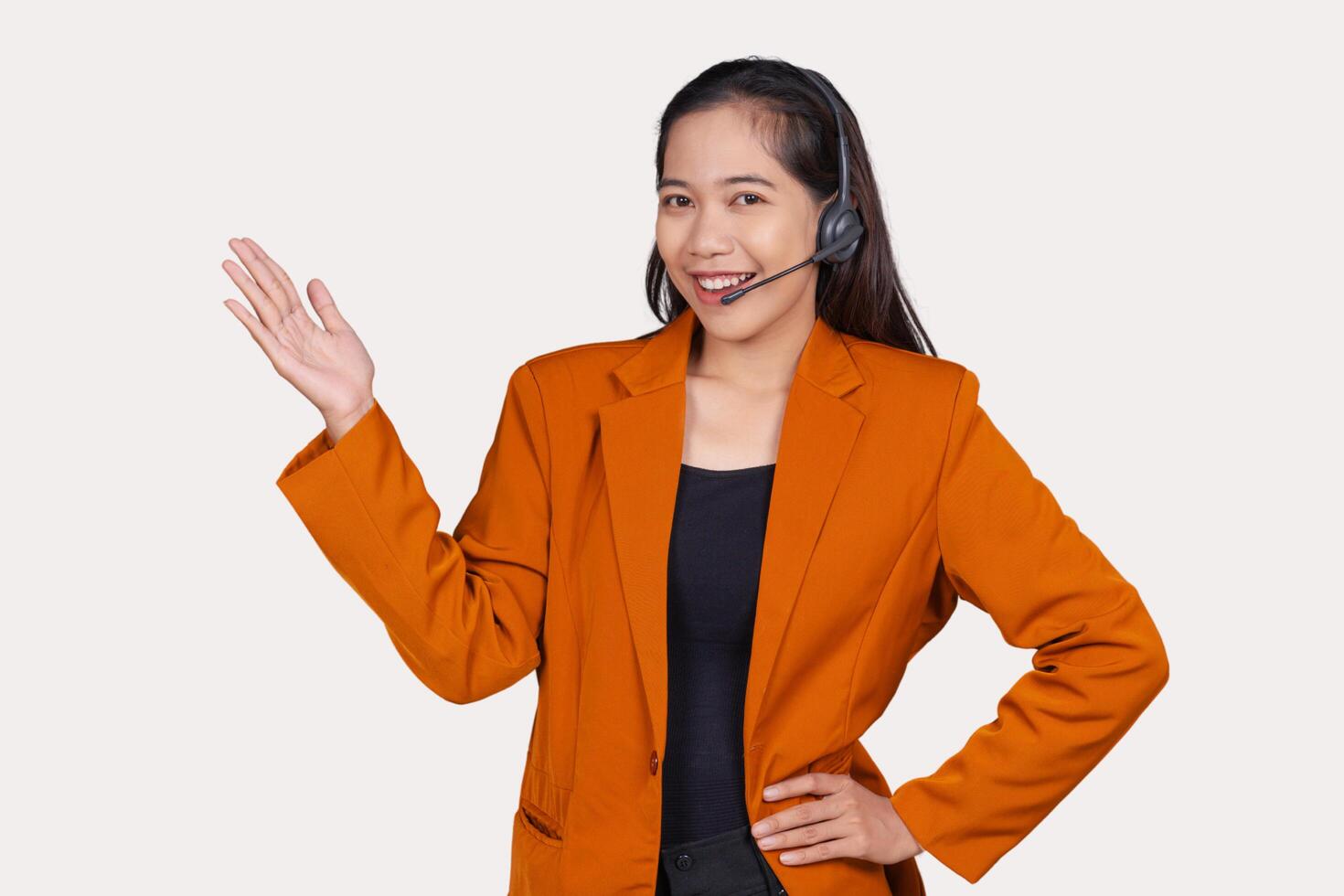 Young Female Customer Service Representative Agent Presenting or Explaining Isolated On Background photo