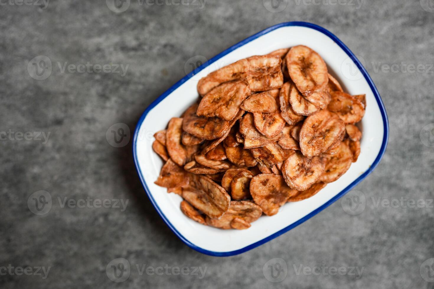 Fried banana chips. Top view photo