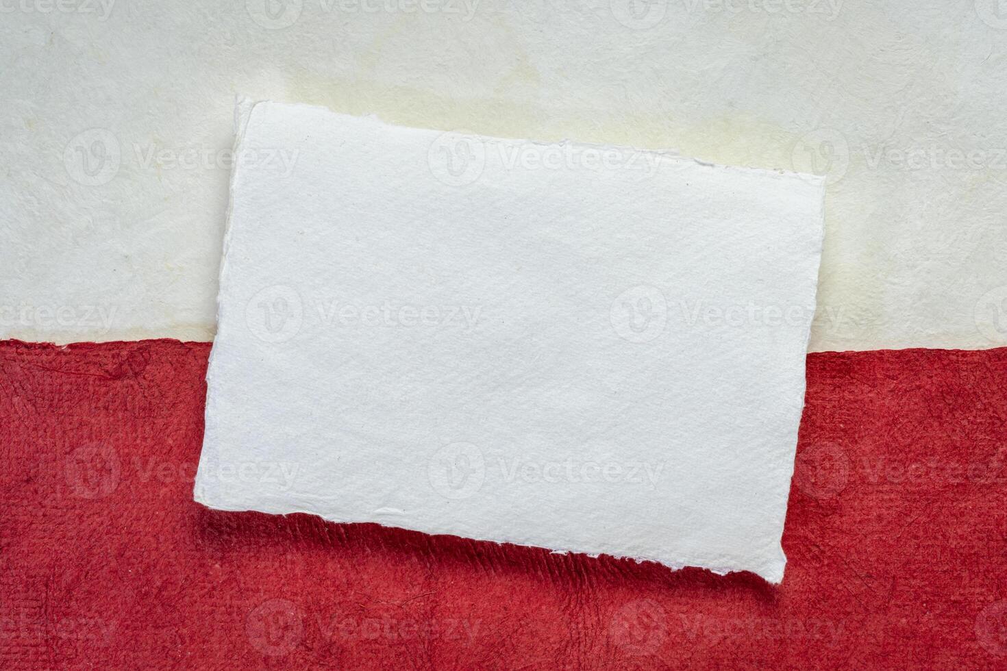 paper abstract in colors of Polish national flag, white and red photo