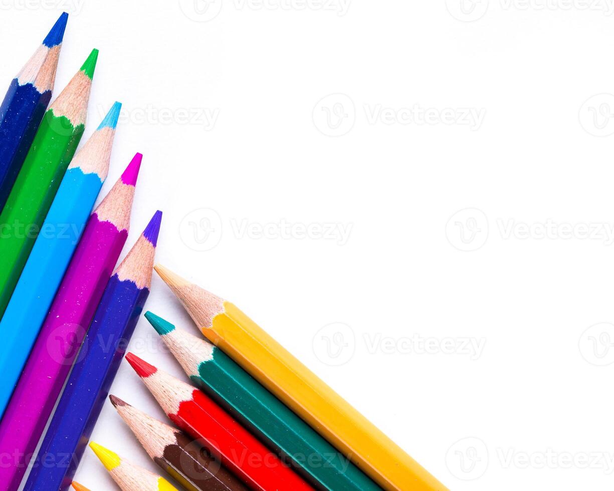 Collection of colorful pencils arranged on a white background showcasing creative potential in art and design photo