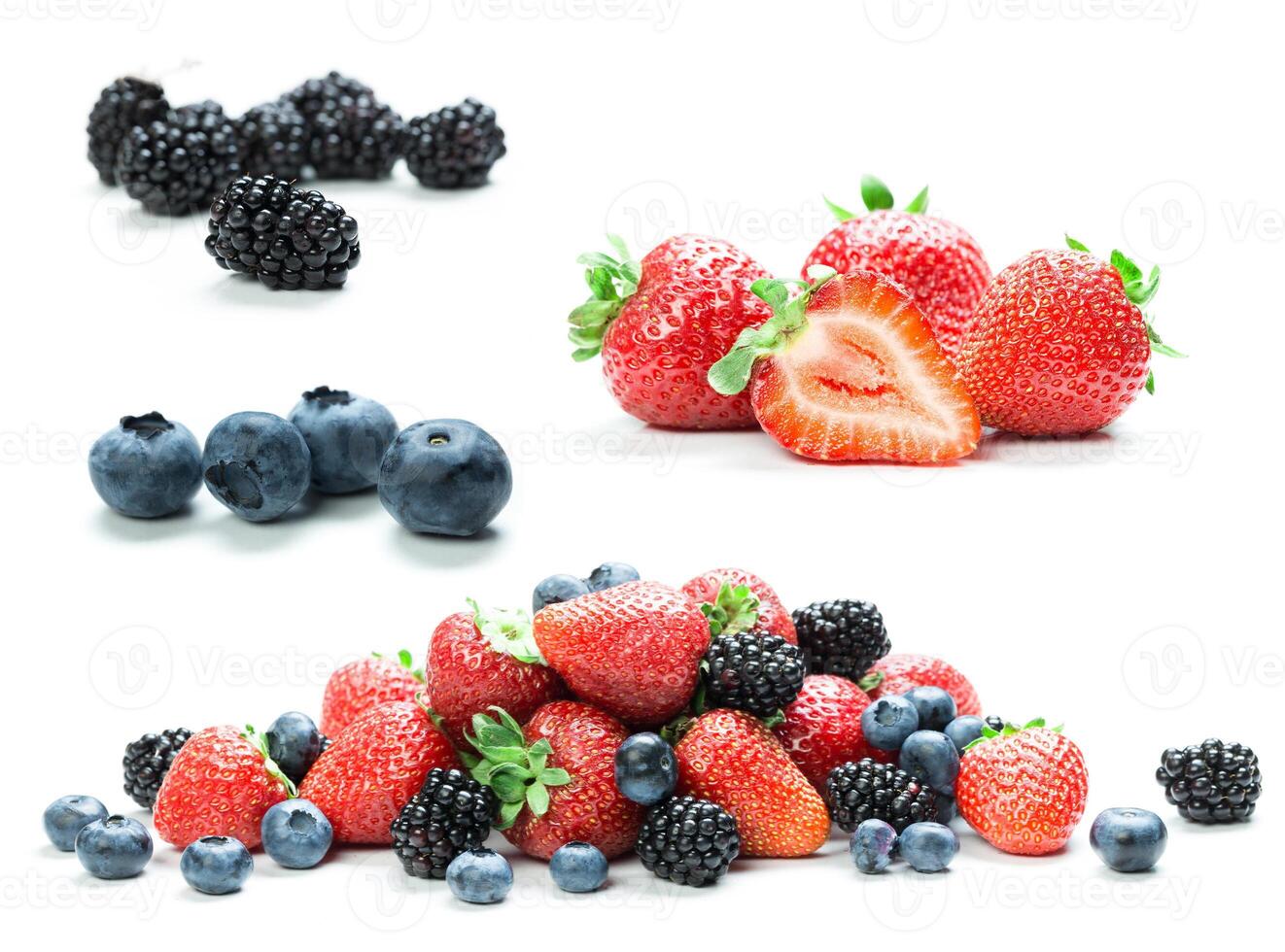 Fresh berries including strawberries, blueberries, and blackberries arranged creatively on a white background photo