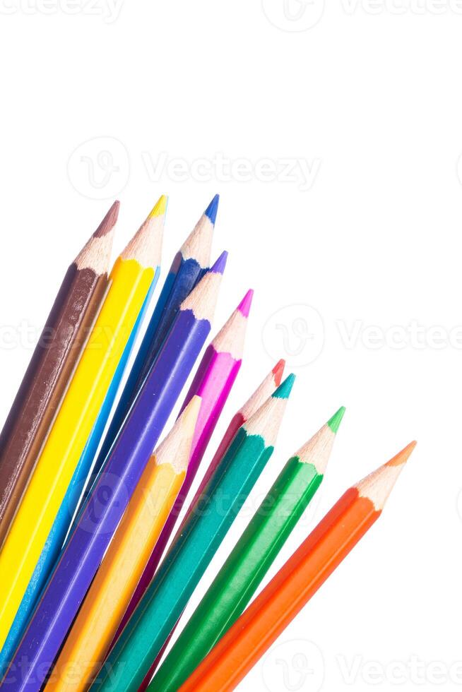 Bright assortment of colored pencils arranged in a vibrant and artistic display on a white background photo
