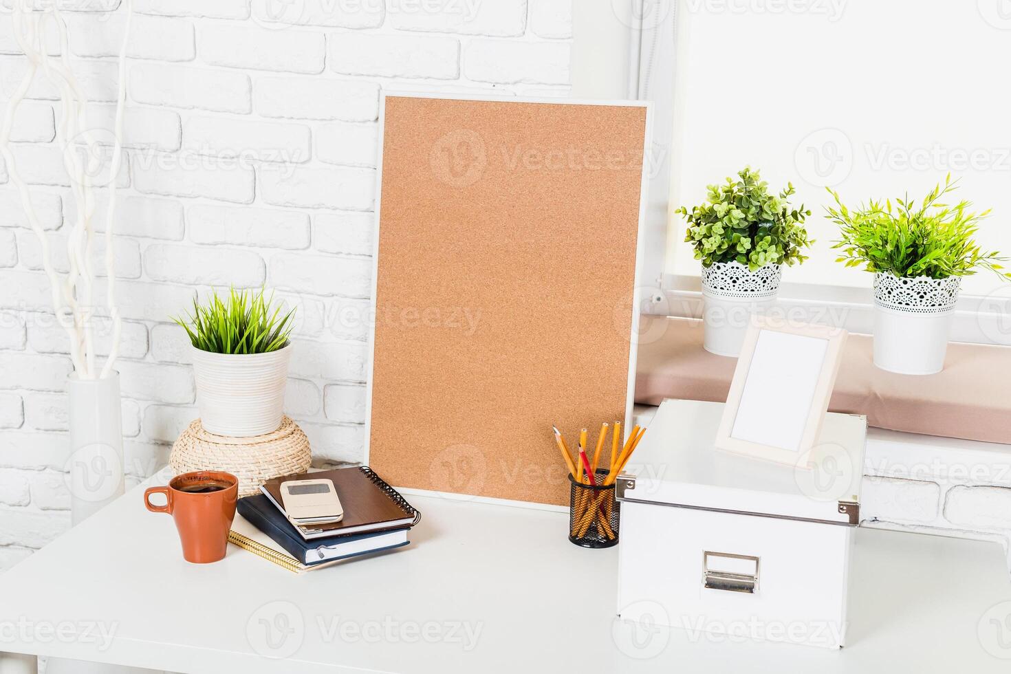Workspace setup featuring natural elements and organization tools with a clean design ideal for productivity photo