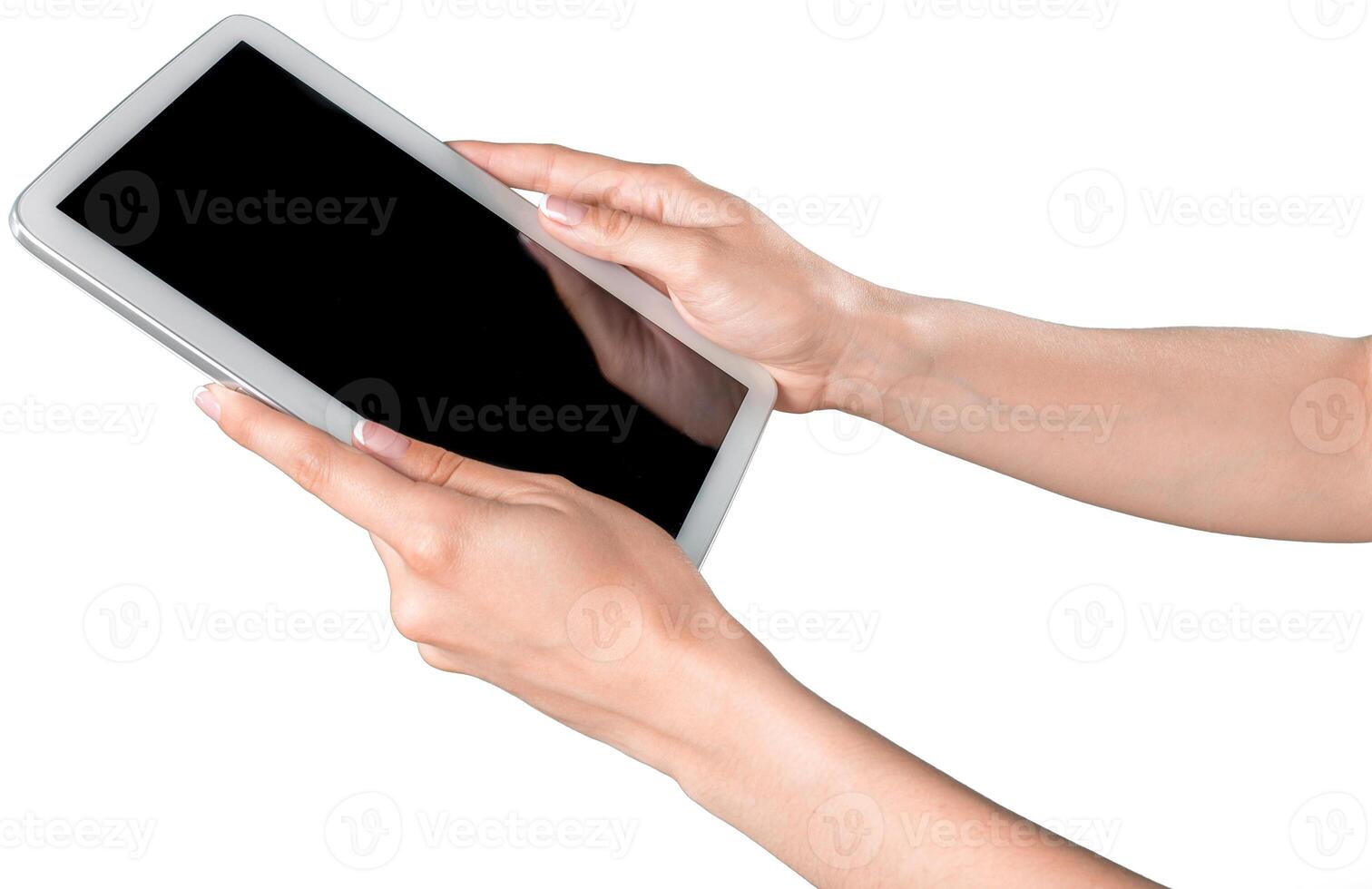 Individual holds a tablet in hands ready to engage in a digital activity indoors photo