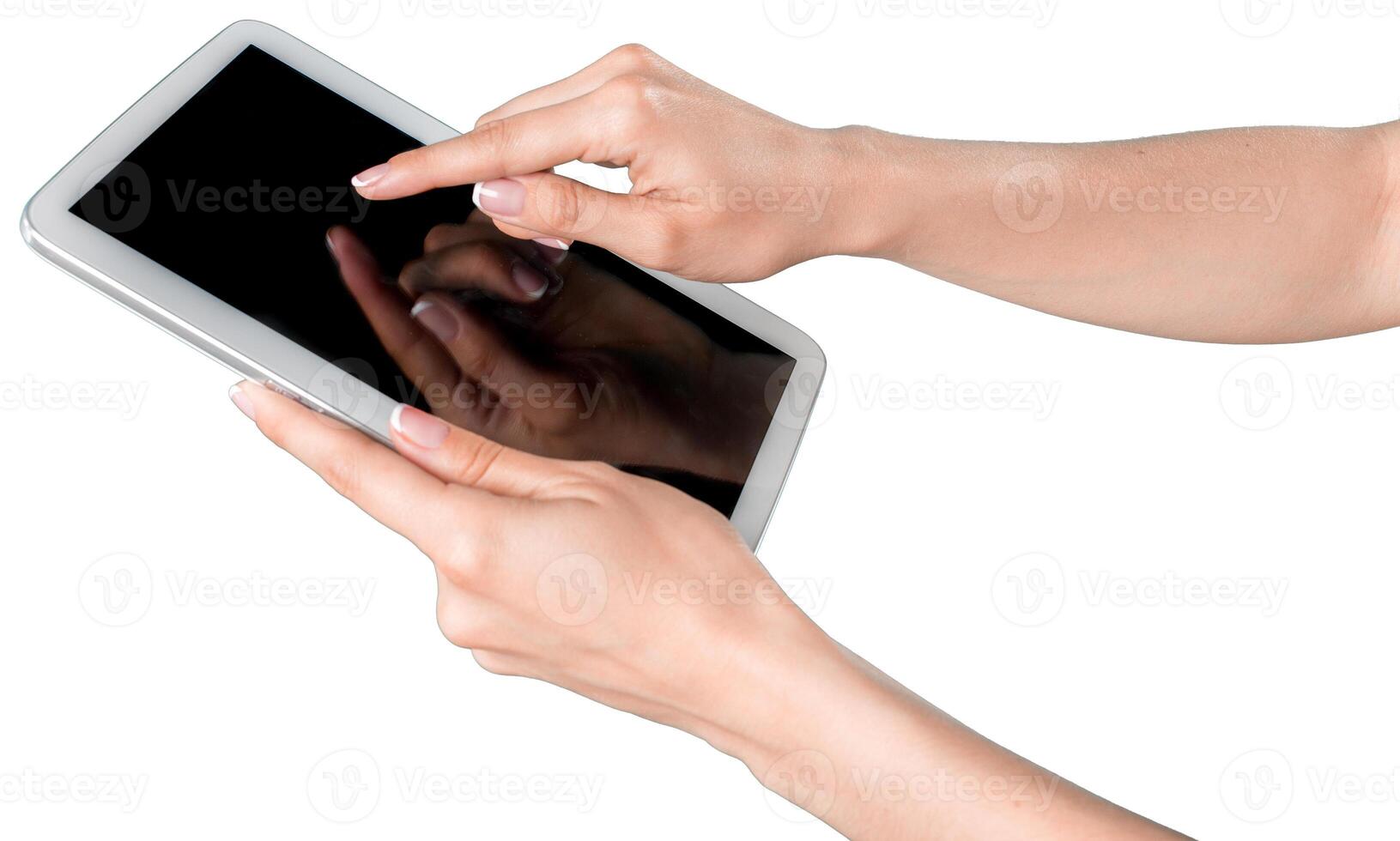 Hands interact with a touchscreen tablet displaying a black screen in a modern setting during a productive moment photo