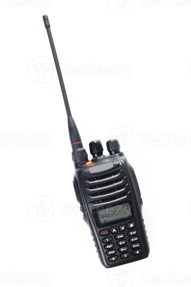 Portable two-way radio with long antenna used for communication in outdoor activities photo