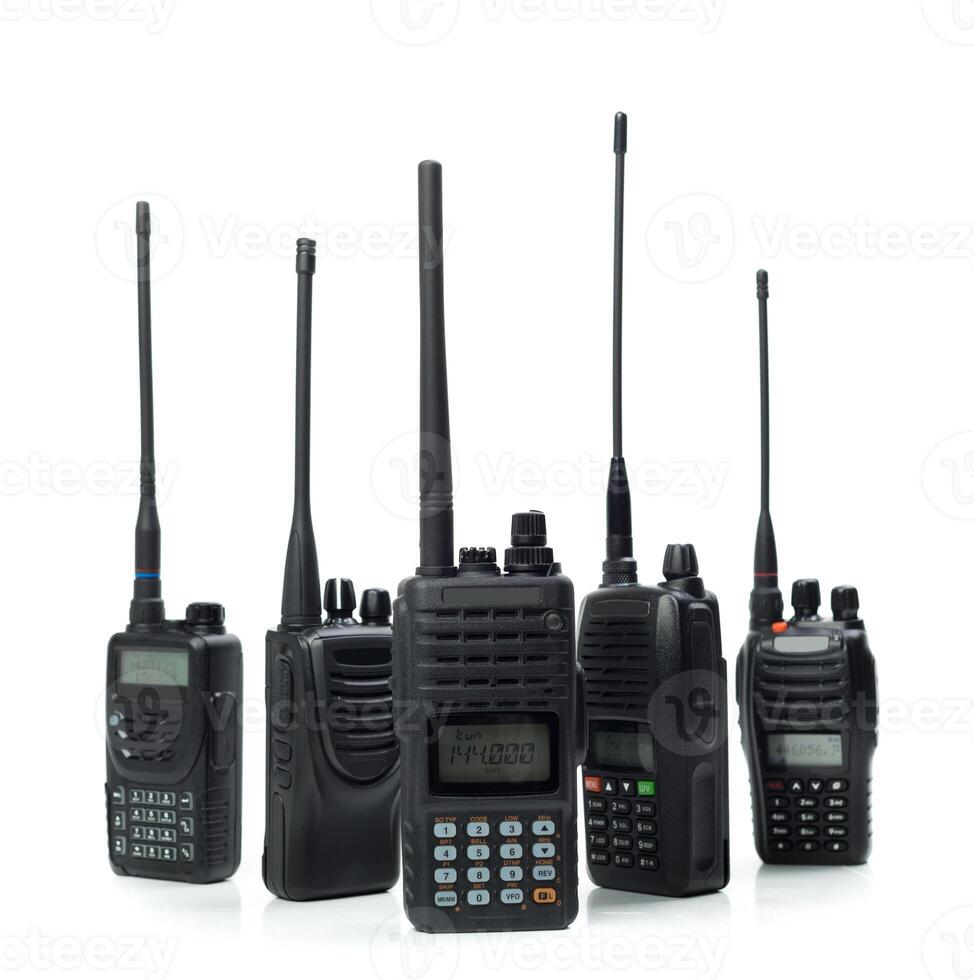 Collection of various handheld radio devices used for communication in different settings and environments photo