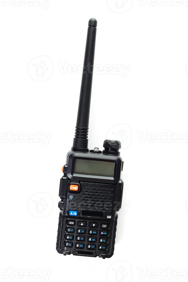 Handheld two-way radio with extended antenna for outdoor communication in remote areas during daytime travel photo