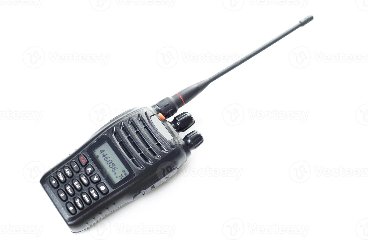 Two-way radio with digital display and antenna on a white background for communication needs in various activities photo