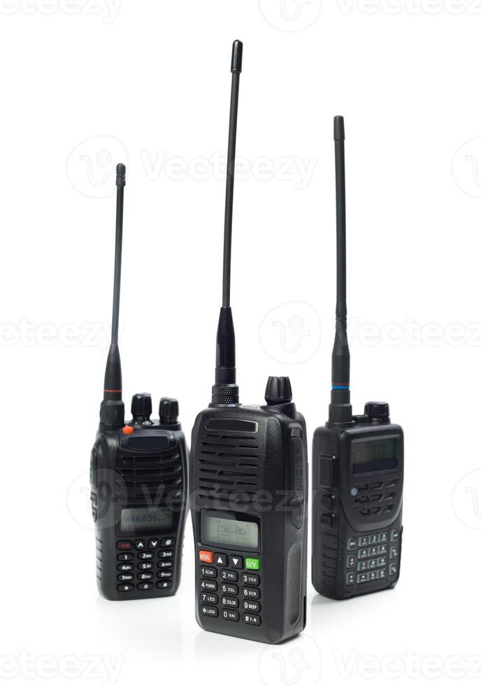 Various models of walkie talkies displayed on a white background for communication technology enthusiasts photo