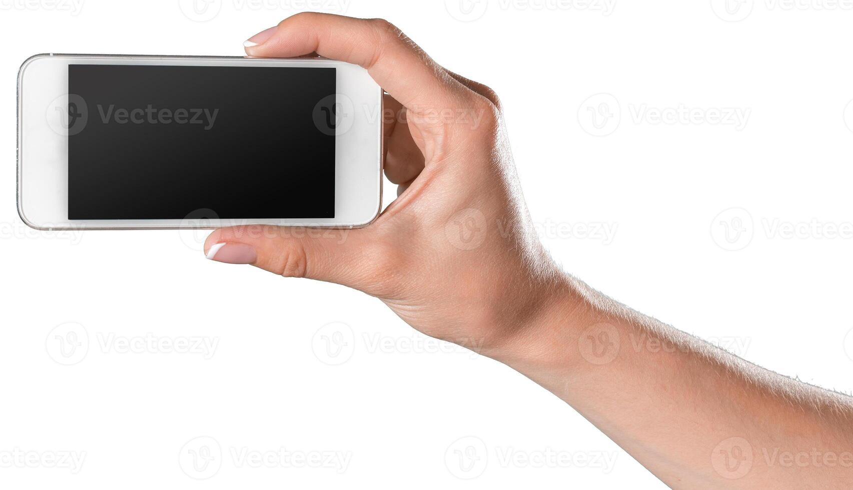 Hand holding a blank smartphone display against a white background in a casual setting photo