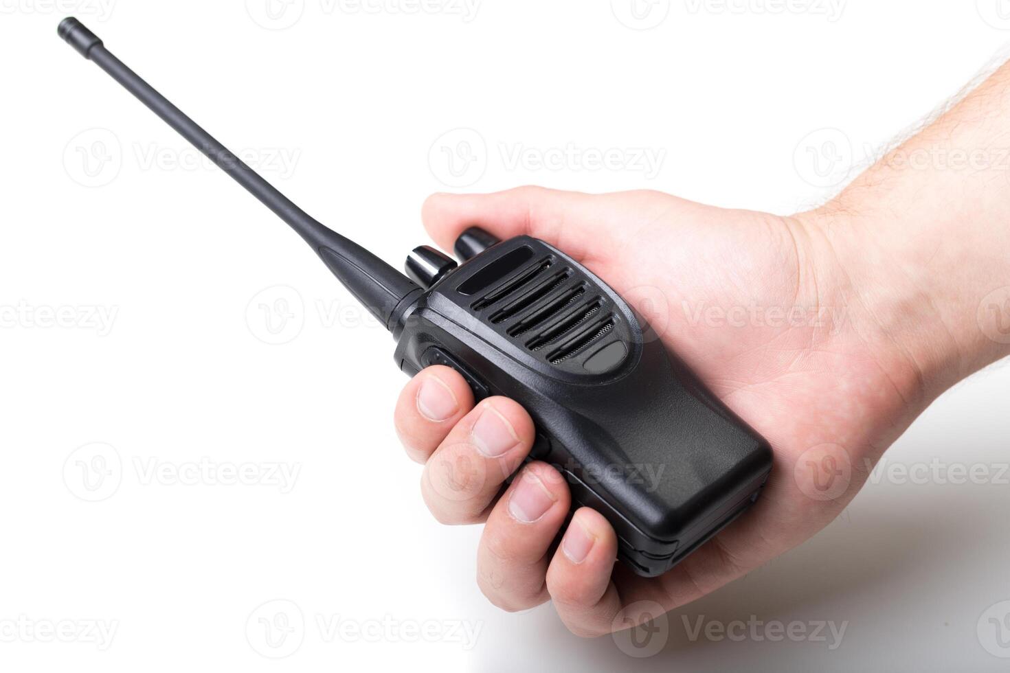 Handheld radio communication device held in a person's hand showing wireless capability and practicality for instant messaging photo