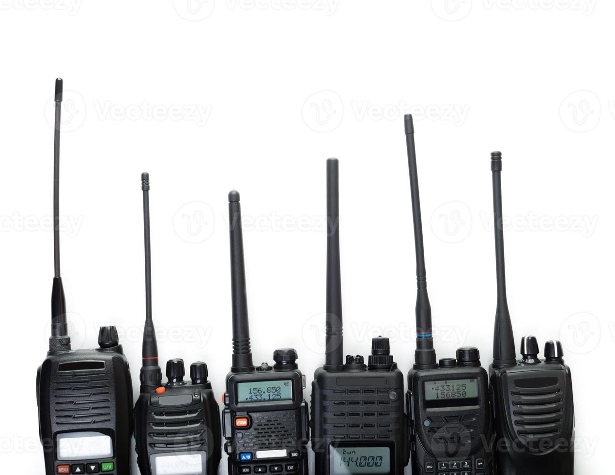 Various models of two-way radios arranged in a row showcasing different designs and features for communication needs photo