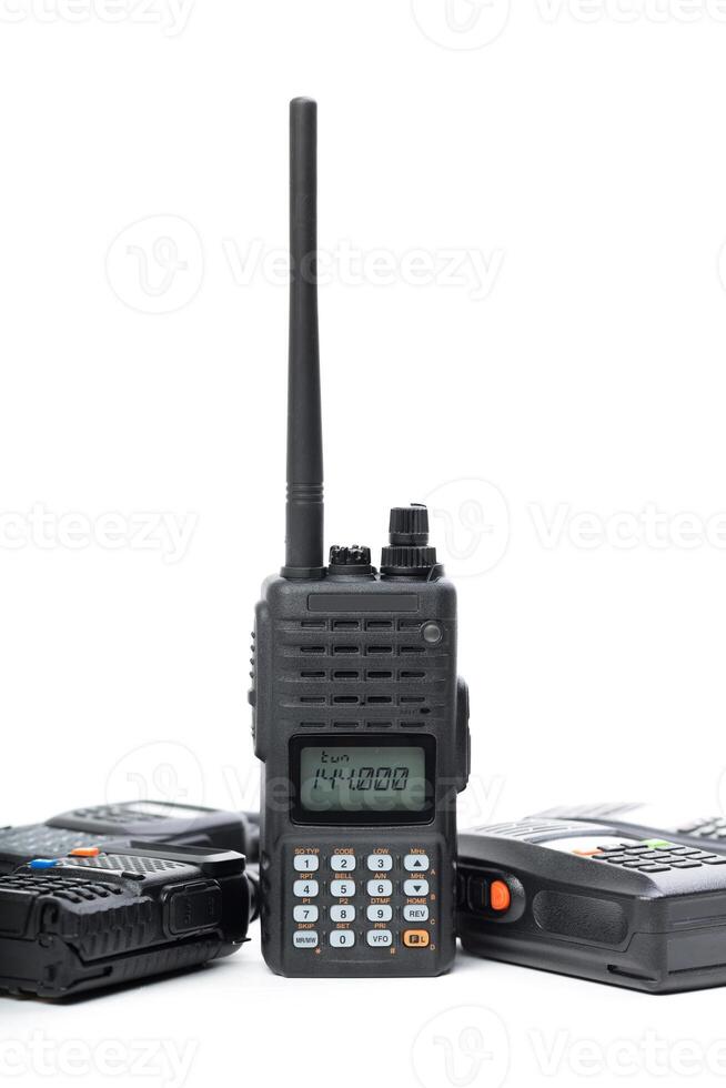 Communication devices arranged in a creative layout on a white background demonstrating their features and usability photo