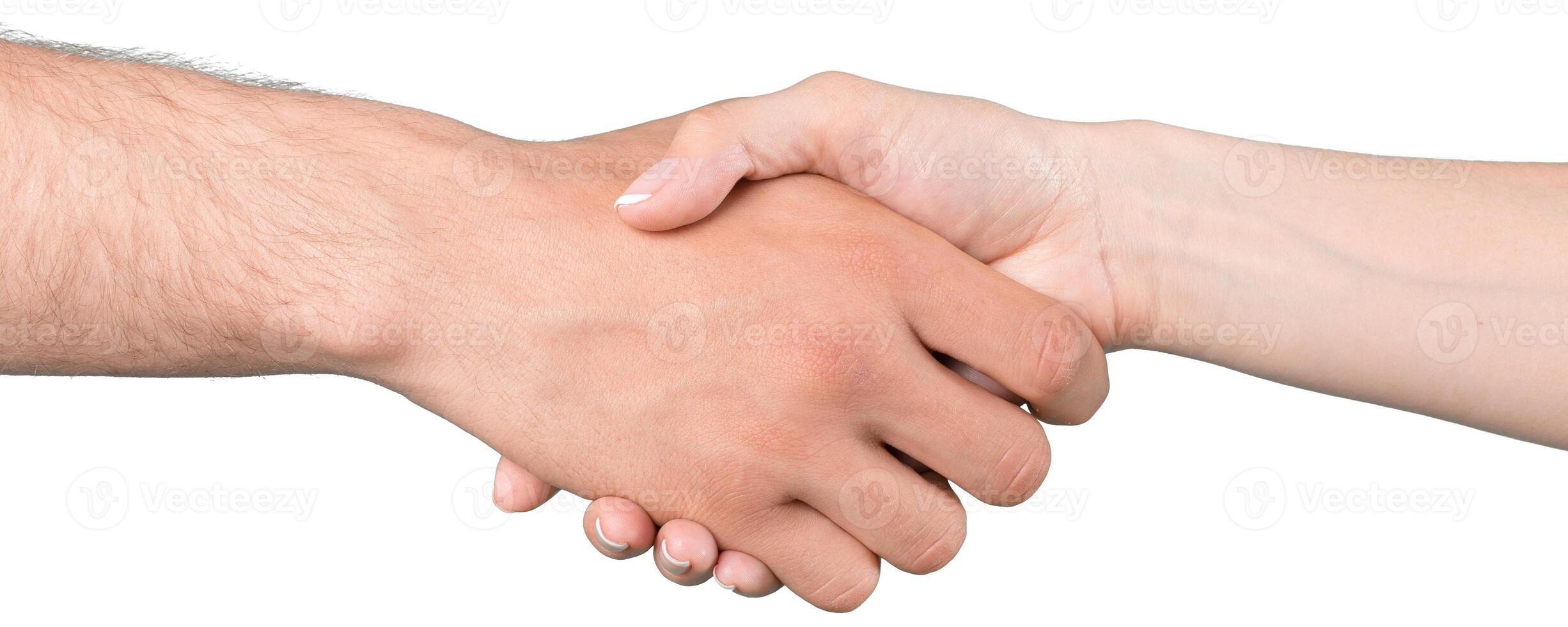 Handshake between two people signifies agreement and collaboration in a professional setting photo