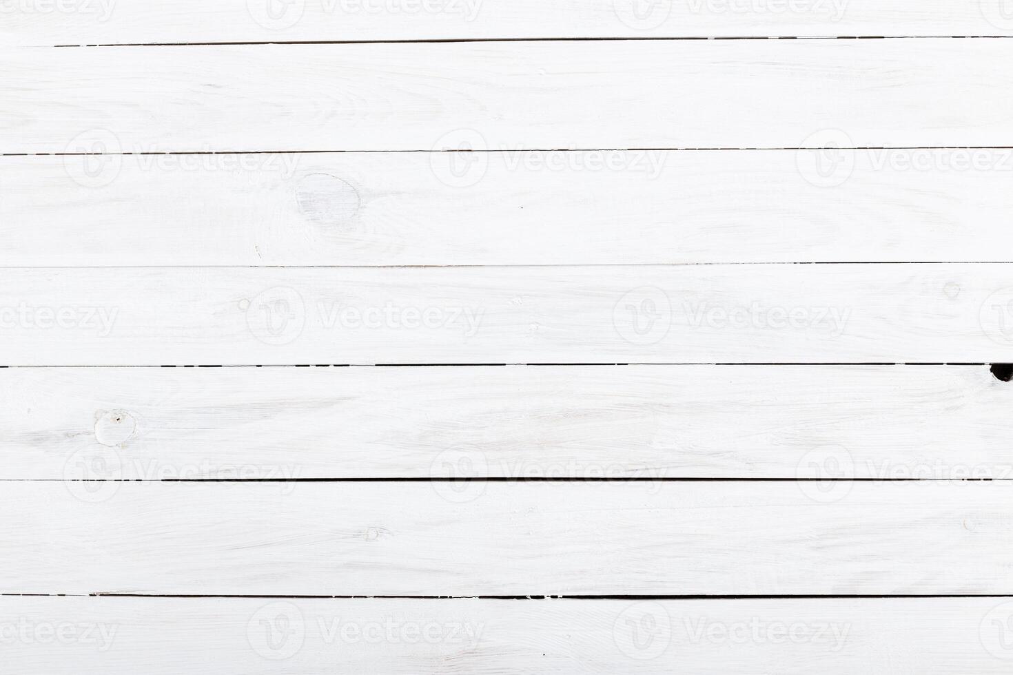White wooden surface creating a clean minimalist backdrop for various creative projects and designs photo