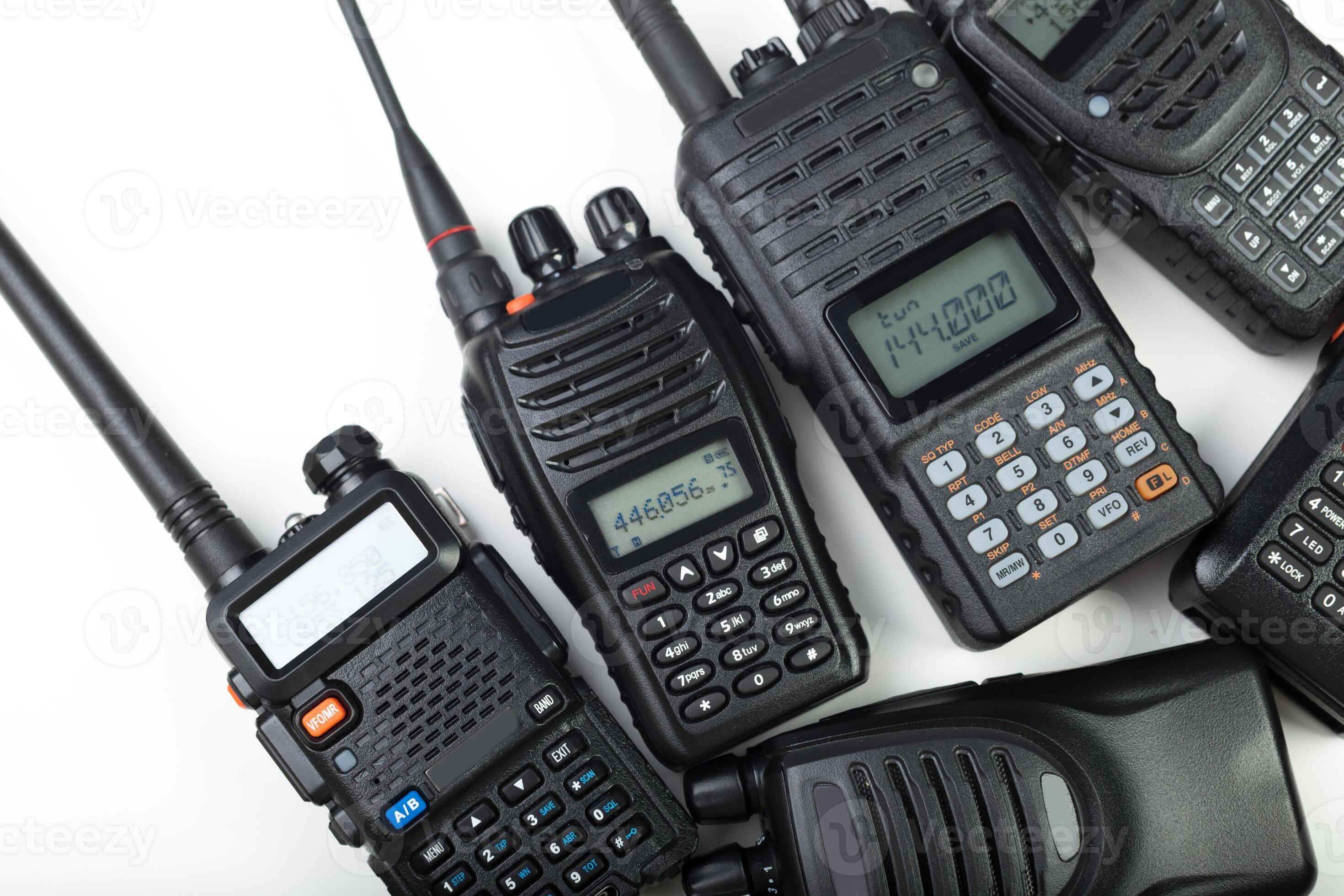 Various handheld radios arranged in a flat layout highlighting ...
