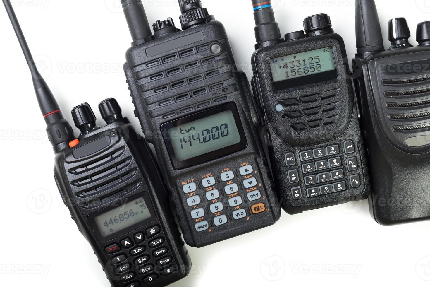 Various models of two-way radio communication devices on a white background photo