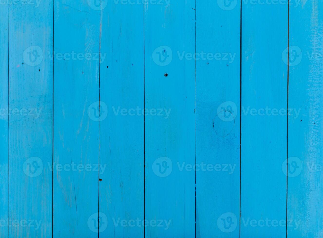 Bright blue wooden boards create a vibrant backdrop for creativity and inspiration in various artistic projects photo