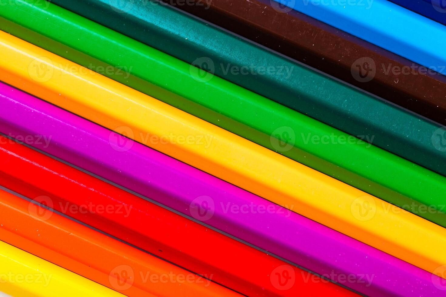 Brightly colored crayons arranged in a vibrant display highlighting shades of creativity and artistic expression photo