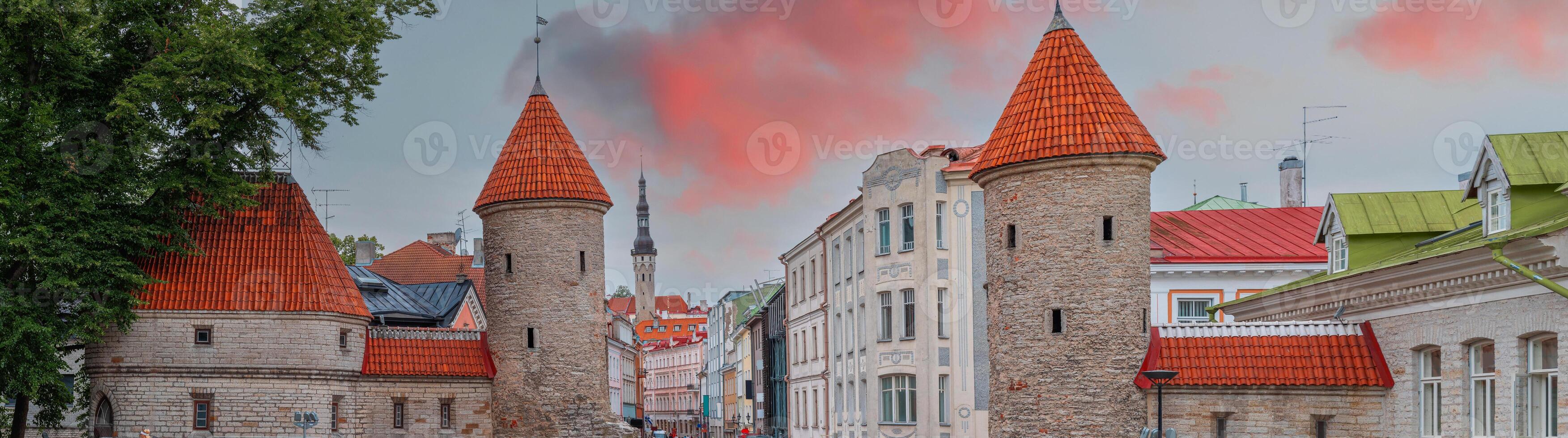 A street with a clock tower and a building photo