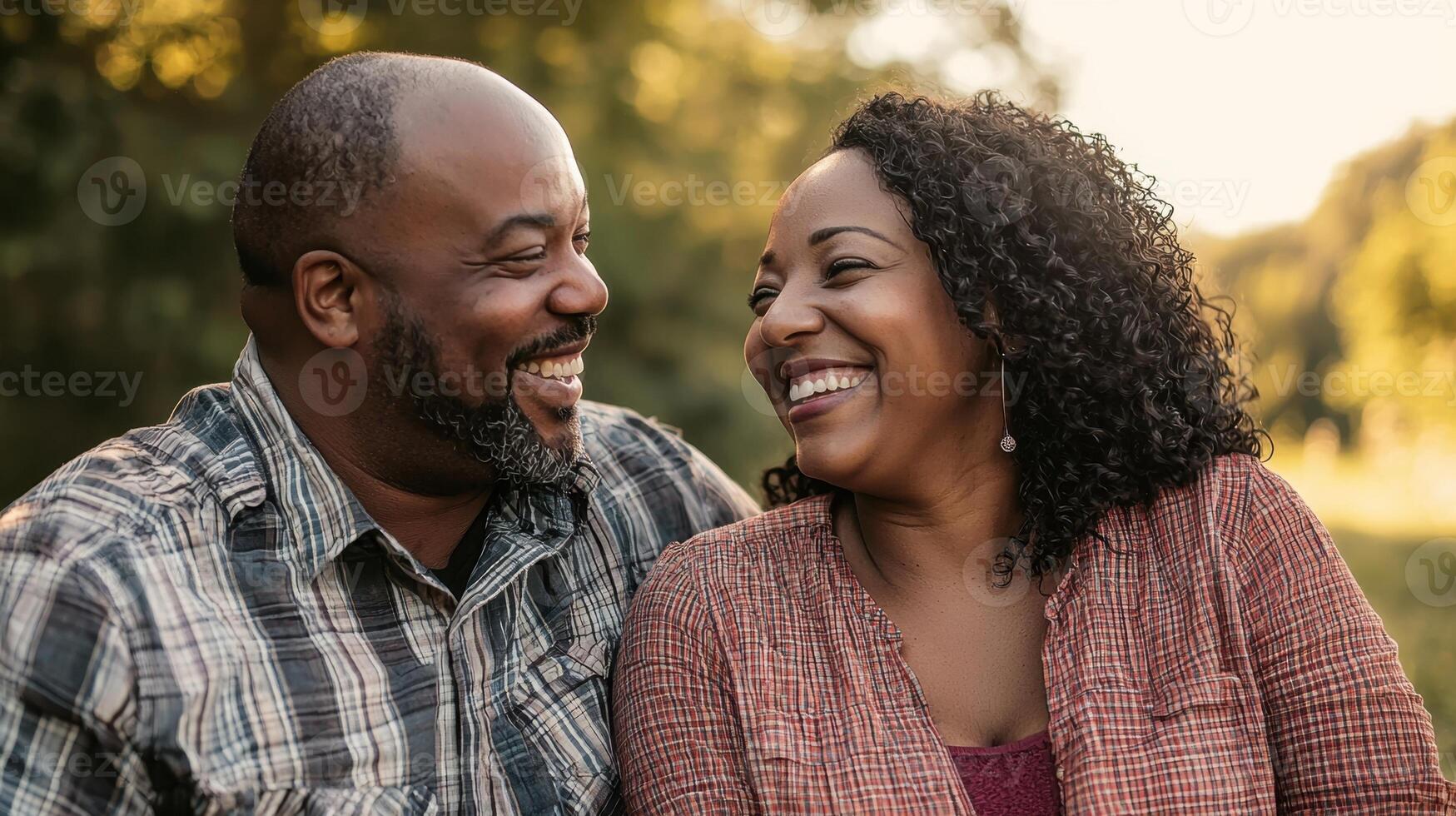 Couple in park laughing photo