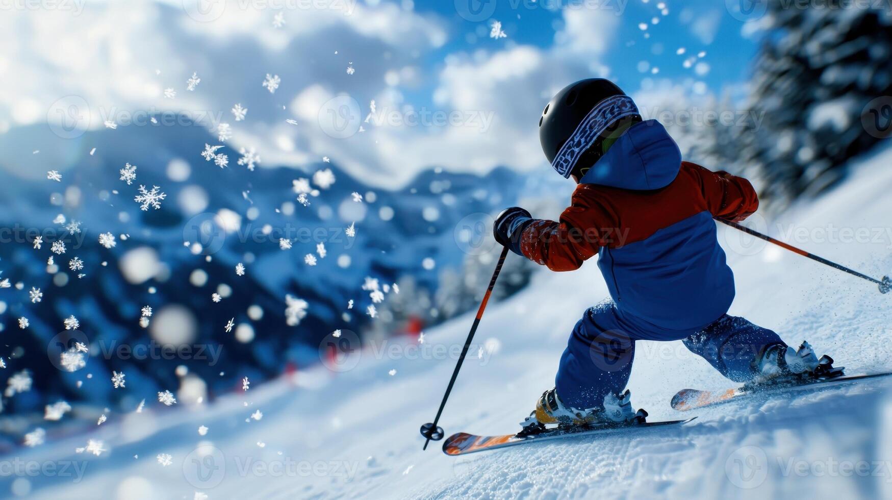 A child on skis in the snow photo