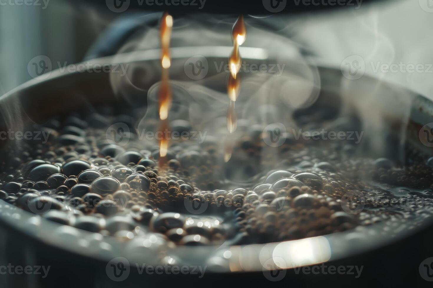 Coffee beans being poured into a pot photo