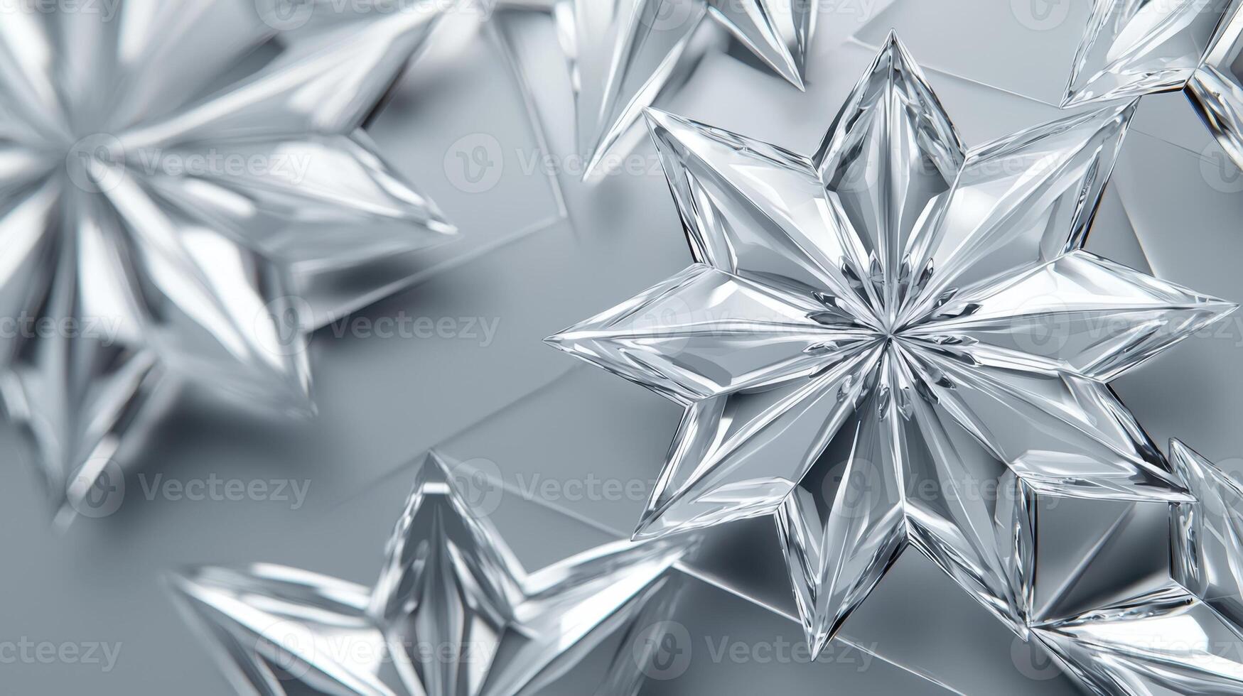 Delicate crystal snowflakes are displayed elegantly on a shiny surface, reflecting light and creating vibrant patterns. This arrangement highlights the artistry and beauty of winter decor photo