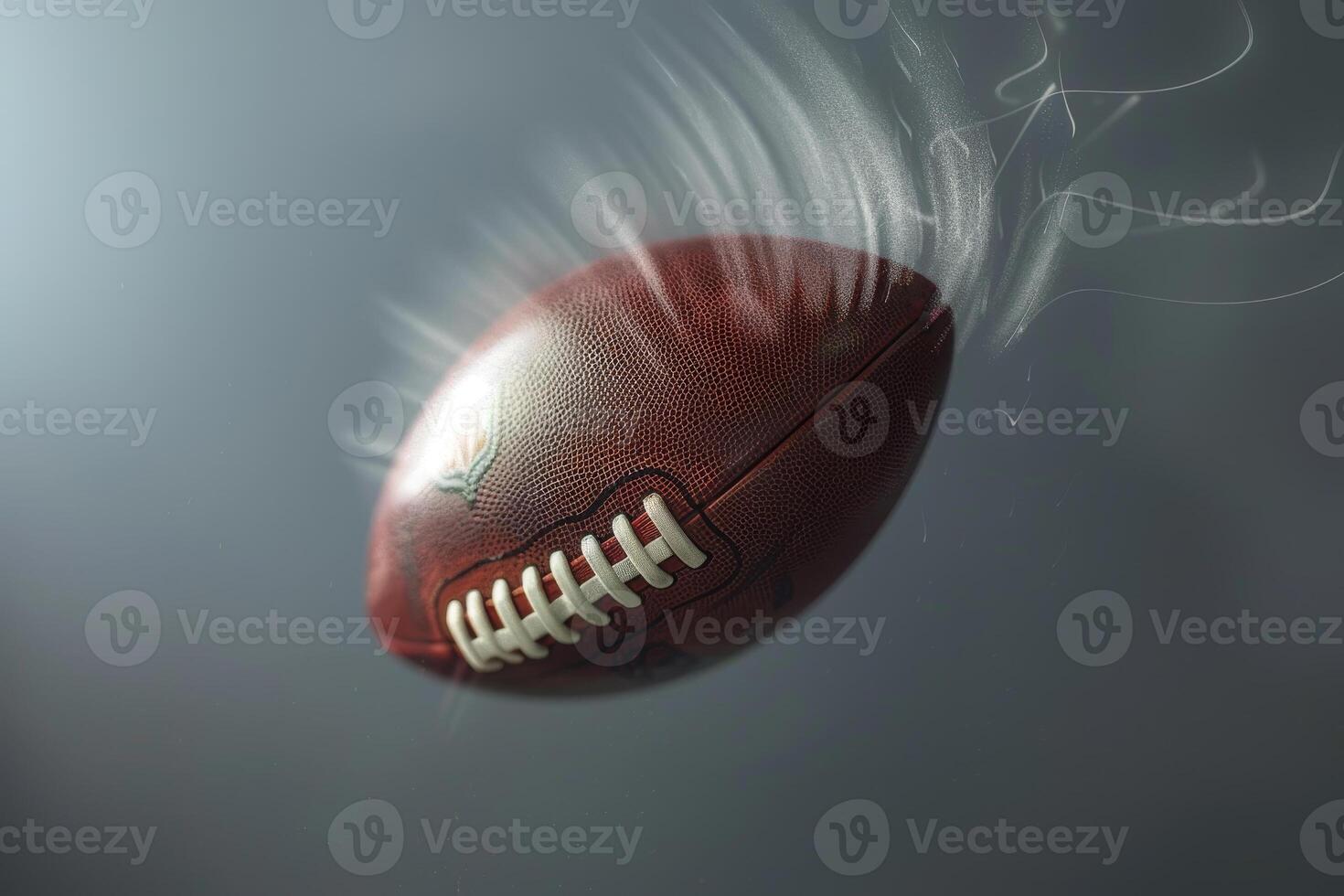 A football is shown in mid-air with a white line on it photo