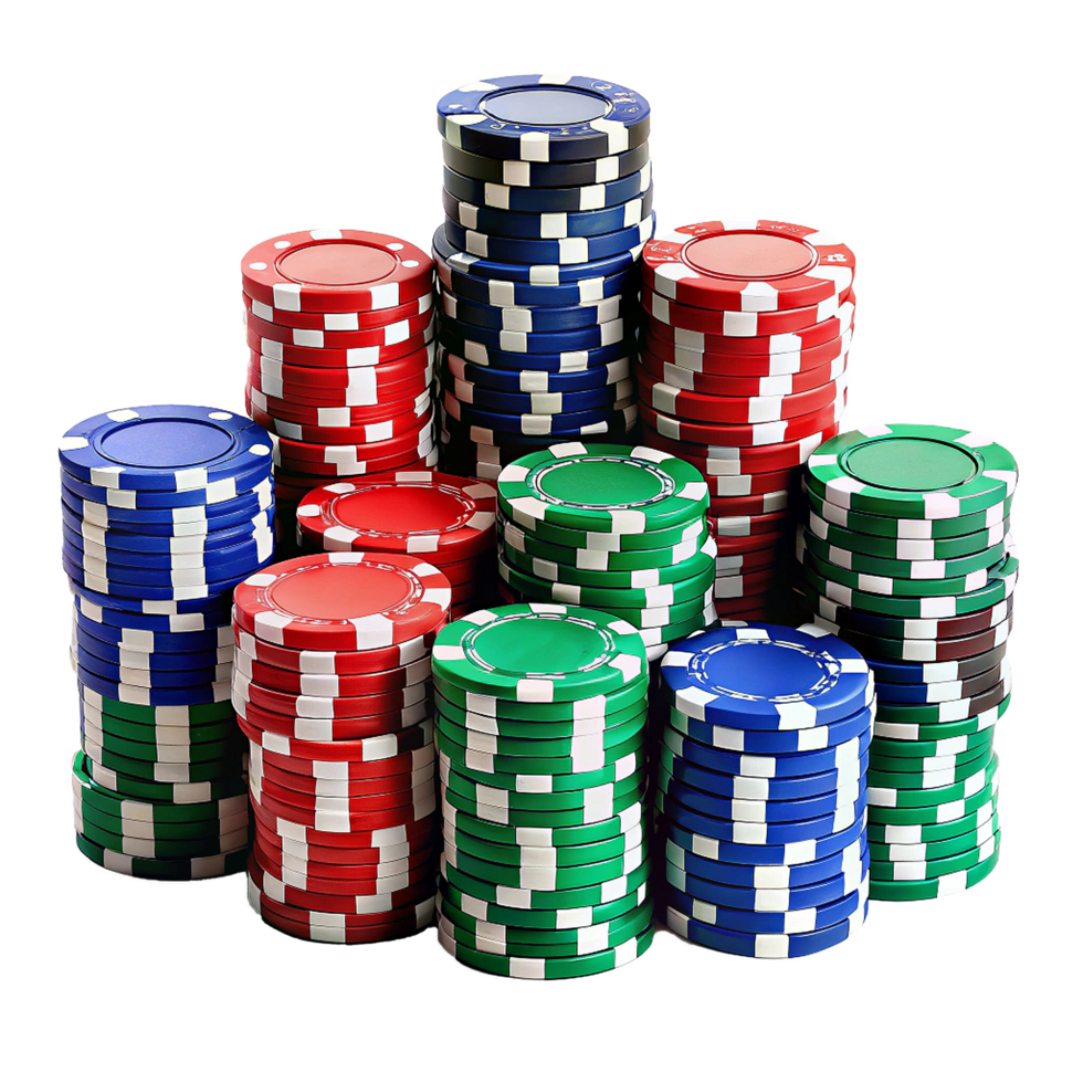 A CloseUp View of Multiple Stacks of Poker Chips in Red, Blue, and Green png