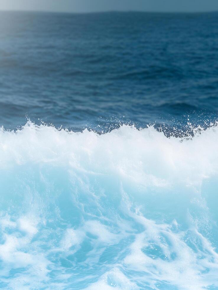 A wave is breaking on the ocean surface photo