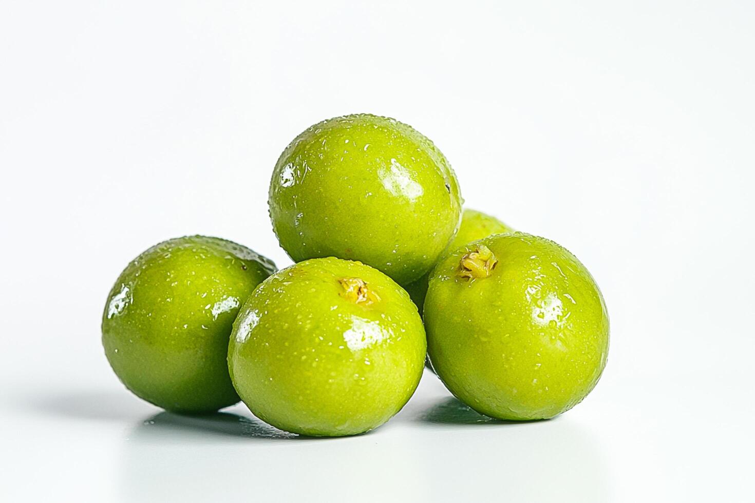 A pile of green fruits photo