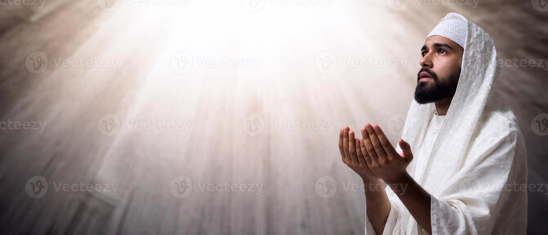 Middle Eastern Muslim man in prayer. Devotion to Allah and Islamic religious practices. Copy space photo